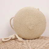 Sac bandoulière femme rond en paille tressée style bohème chic