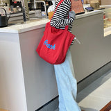 Sac de plage rouge 'Beach' motif bleu, vue de face