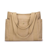 Sac cabas en toile camel, vue frontale, avec anses camel et bouton pression doré