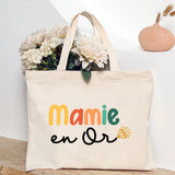 Sac fourre-tout en toile beige avec le message 'Mamie Chérie de' et des cœurs marron