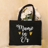 Sac fourre-tout en toile noire avec le message 'Une Mamie c'est comme une maman mais en mieux'