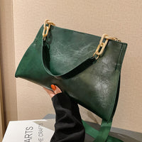 Cross-body handbag in soft faux leather